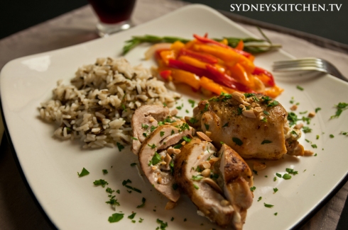 Almond-Stuffed Chicken with rice and peppers